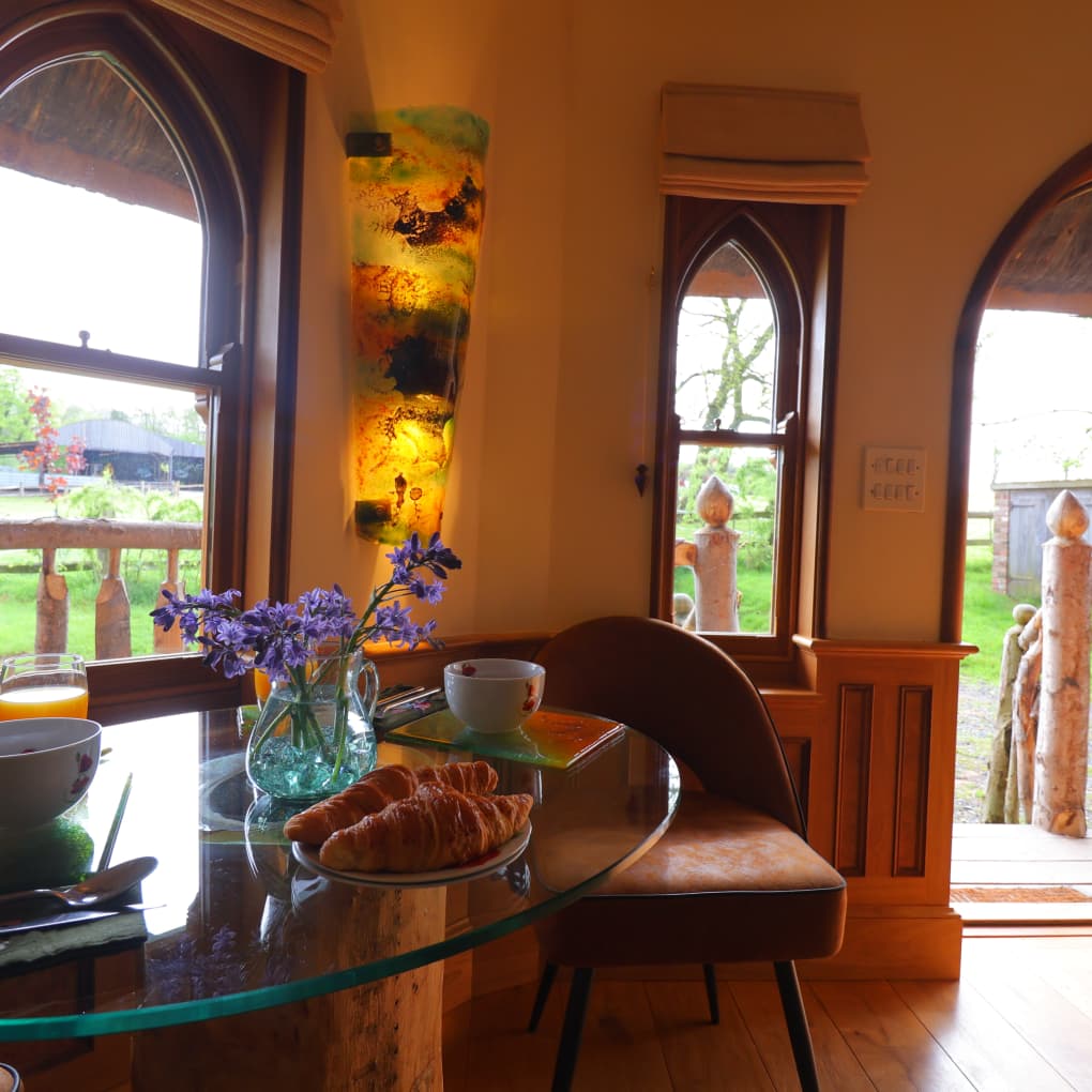 Side view of dining table and front door.