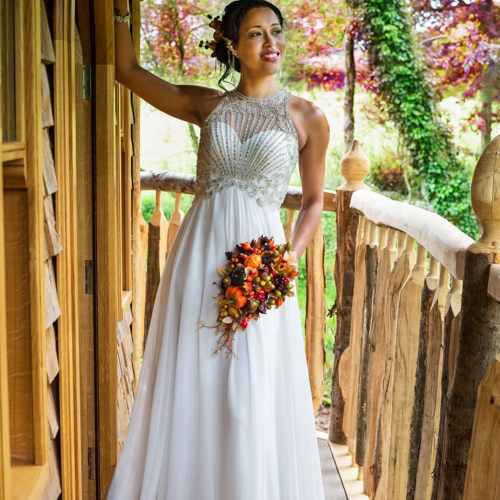 A woman in a bridal outfit on Vivianna's wrap around balcony