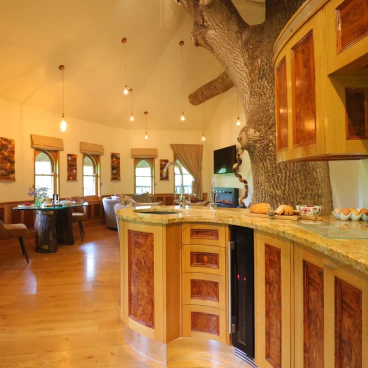 Vivianna's open plan kitchen, leading into the sitting room and dining table