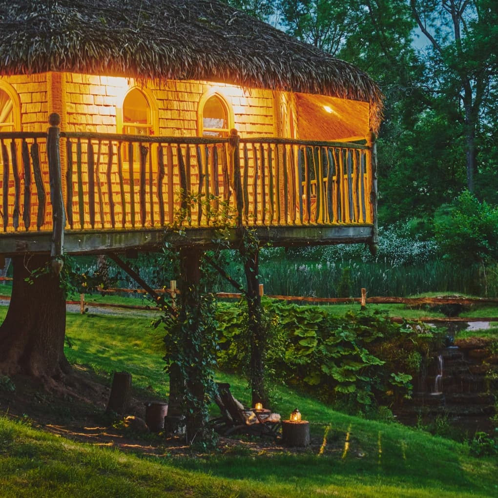 Vivianna's wrap around balcony, lit up at dusk