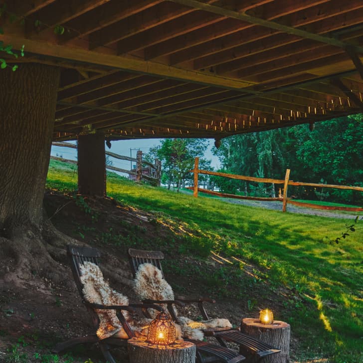 Outdoor seating area underneath Vivianna with full lake view