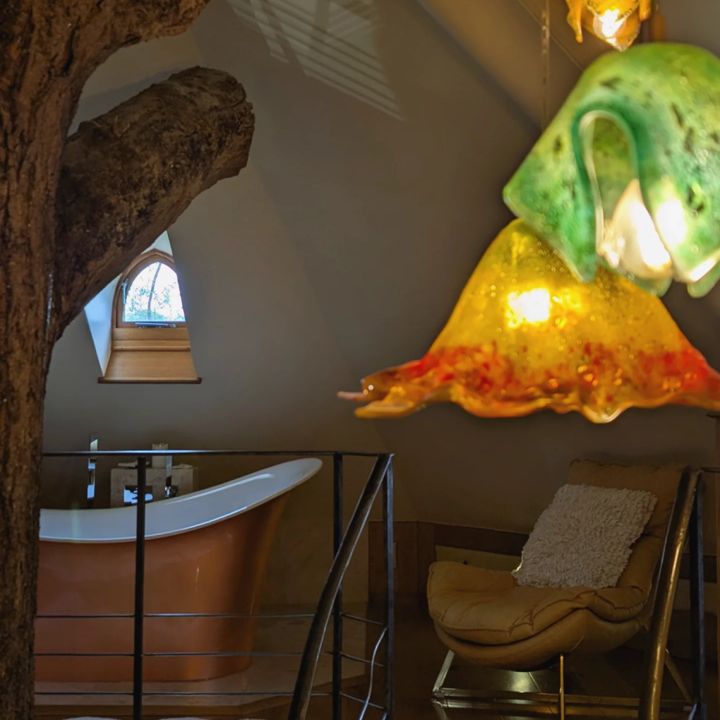 Copper bath tub with star gazing window above