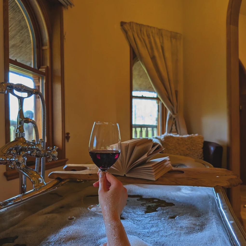 Vivianna's wrap around balcony, lit up at dusk