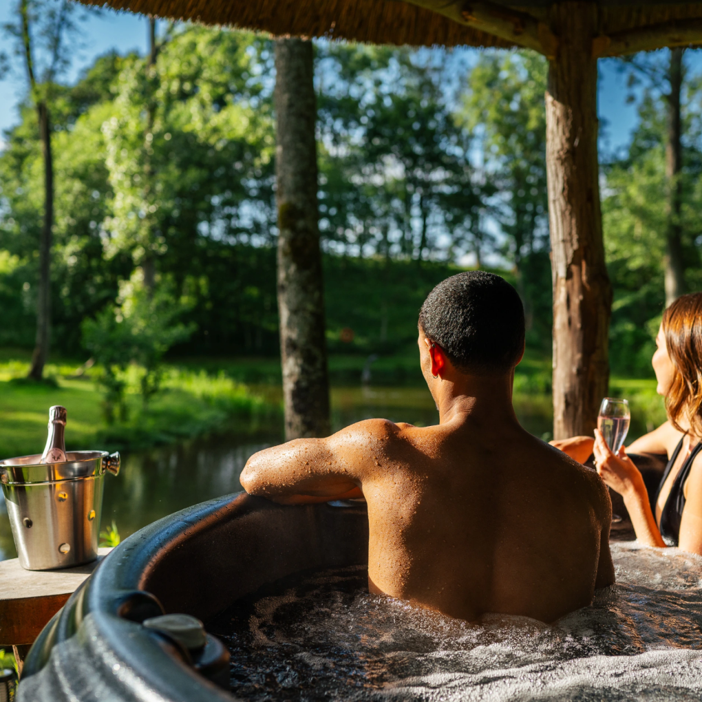 Private hot tub view with surrounding treetops